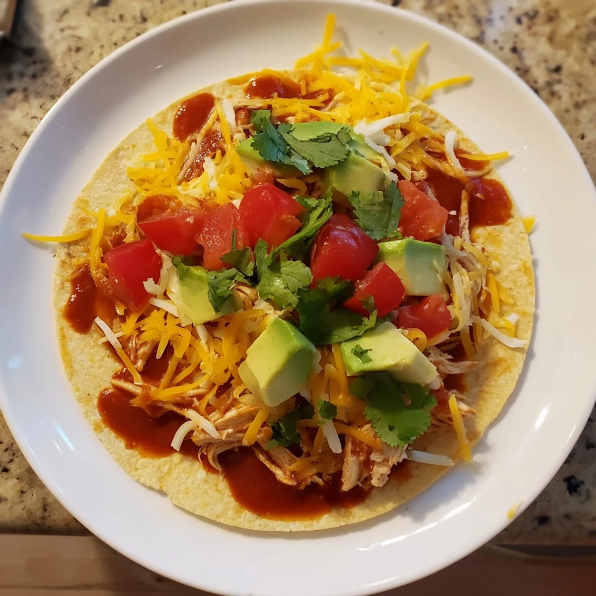 Golden, savory Slow Cooker Shredded Chicken Tacos, ready to be filled with your favorite toppings.