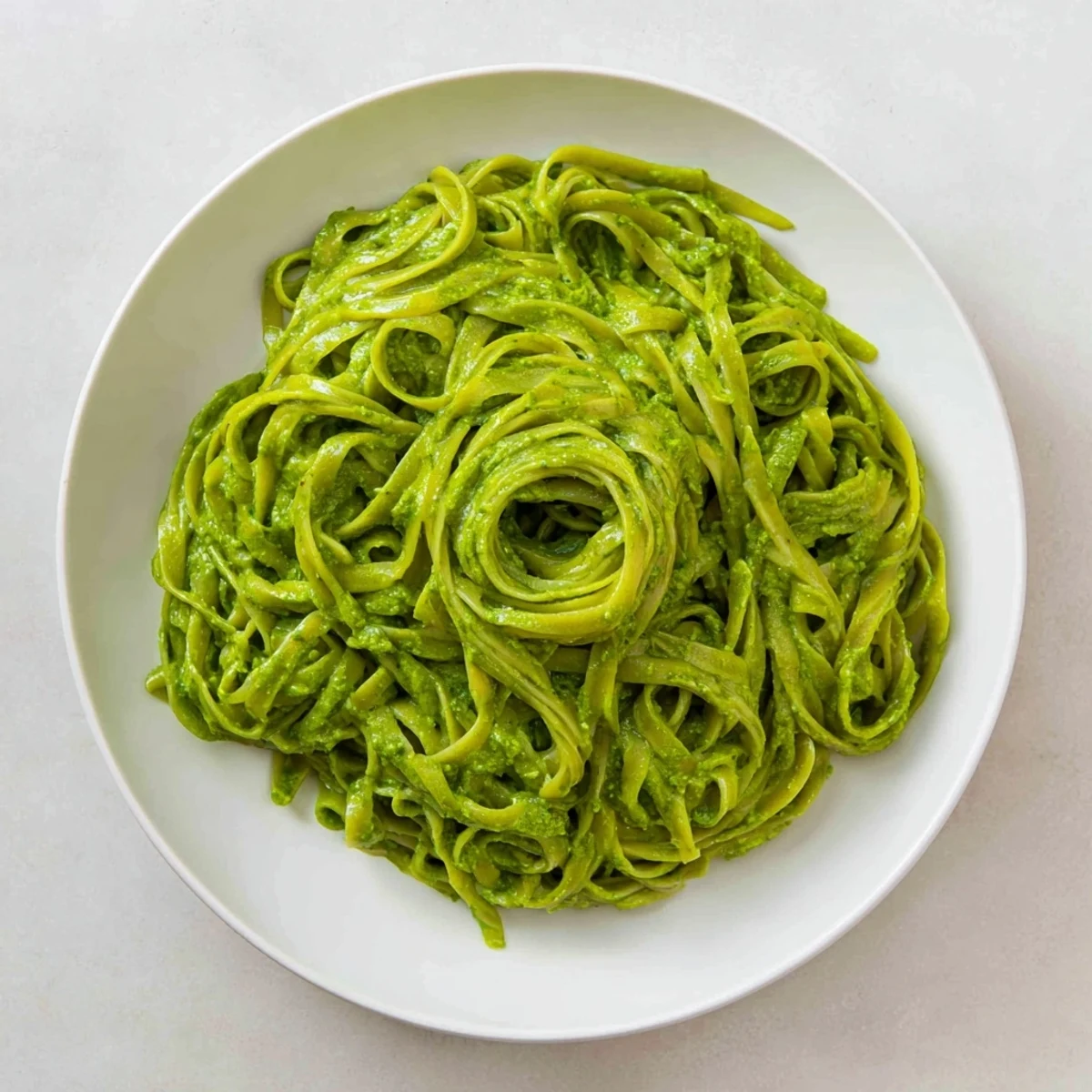 Creamy green goddess pasta sauce, a vibrant dish with fresh herbs and perfectly cooked pasta.
