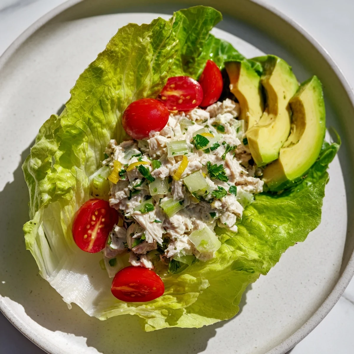 A healthy and easy lunch: flavorful Tuna Salad Lettuce Wraps, featuring fresh, vibrant ingredients and texture.