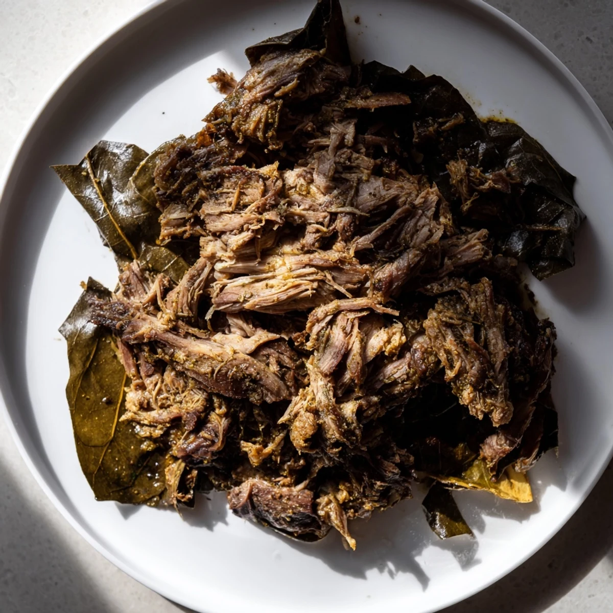 Fragrant Omani Shuwa, a Middle Eastern feast, slowly roasted until tender, paired with rice and a yogurt sauce.