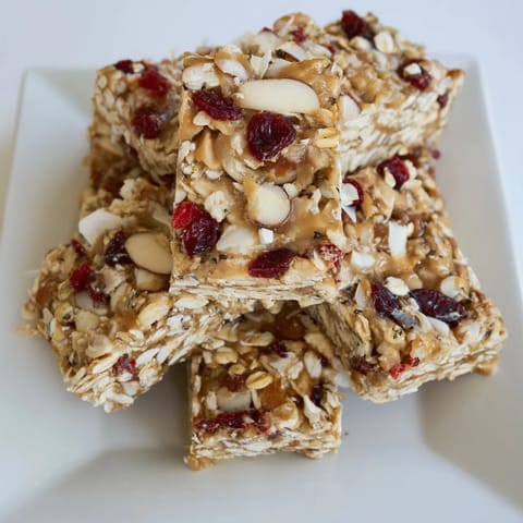These chewy No-Bake Energy Bars are homemade with a perfect blend of oats, nuts, and peanut butter.