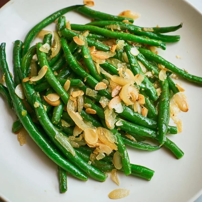 Fresh Sautéed Green Beans with toasted almonds, a simple side dish bursting with savory flavors.