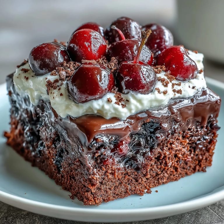Moist chocolate cake base with cherry cola pudding, ready for serving.