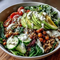 Vibrant Ancient Grains Bowl with Farro, Quinoa, and Chickpeas ready to serve.